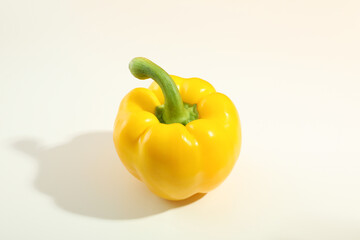 Yellow bell pepper on white background, close up