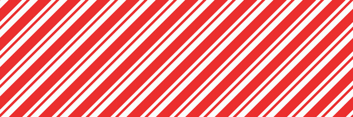 Christmas candy cane striped seamless pattern. Christmas candycane background with red stripes. Caramel diagonal print. Xmas traditional wrapping texture. Vector illustration.