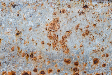 Abandoned old iron sheet with heavy brown rust