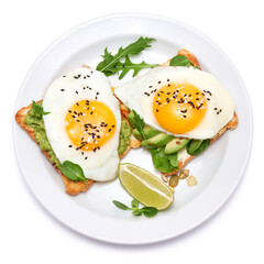 sliced avocado and fried egg on toasted bread isolated on white background