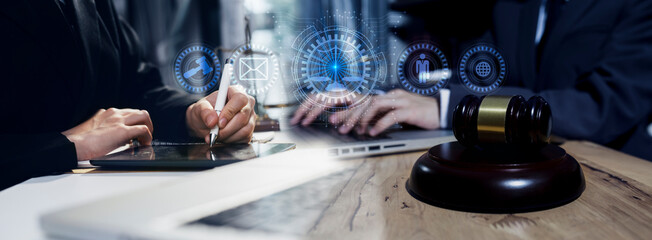 Concepts of Law and Legal services. Lawyer working with law interface icons. Blurred background.	