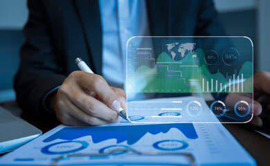 Business people hands working on network and digital finance marketing chart with future technology innovation and digital transformation concept.