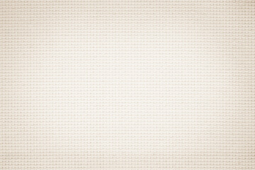 Fabric canvas woven texture background in pattern in light beige cream brown color.