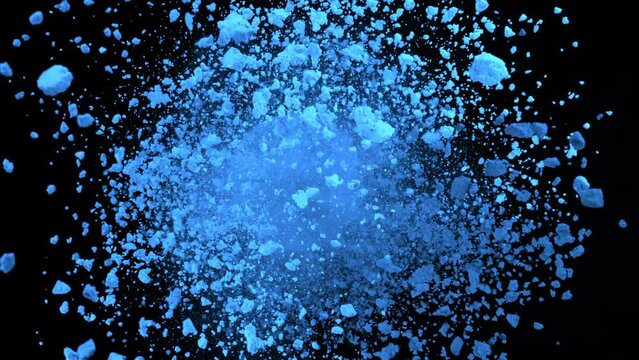 Super Slow Motion Shot of Rotating Blue Powder Expolosion Isolated on Black Background at 1000fps.