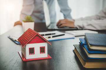 Broker advisor consulting a client. Real estate agent offer hand for customer sign agreement...