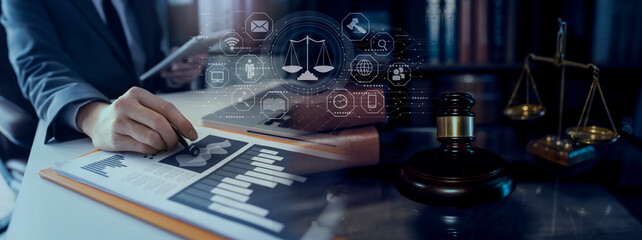 Concepts of Law and Legal services. Lawyer working with law interface icons. Blurred background.	