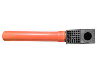 Laying an orange plastic drainage pipe with a rain catcher. Top view.