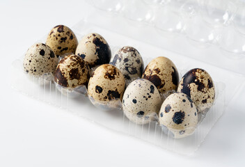 Quail eggs placed on a white background