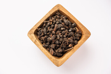 Ayurvedic Nagarmotha - Cyperus Scariosus or Cypriol in a bowl or heap