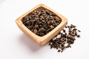 Ayurvedic Nagarmotha - Cyperus Scariosus or Cypriol in a bowl or heap