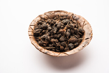 Ayurvedic Nagarmotha - Cyperus Scariosus or Cypriol in a bowl or heap