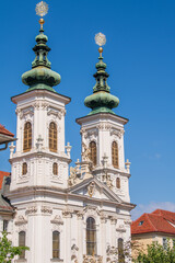 Fototapeta na wymiar Towers of Baroque Mariahilf Convent and Parish Church (Mariahilferkirche) in Graz, Styria (Austria)
