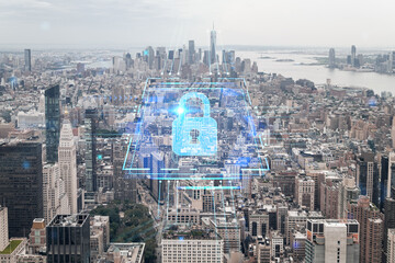 Fototapeta premium Aerial panoramic city view of Lower Manhattan, Midtown, Downtown, Financial district, West Side at day time, NYC, USA. Concept of cyber security to protect confidential information, padlock hologram