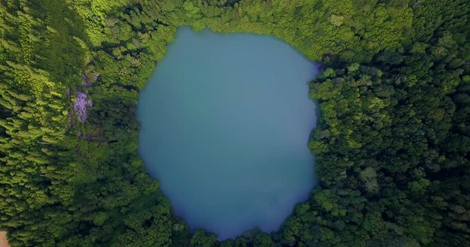 Lagoa do Congro bird eye vertical 4k drone view. High quality video of a lake in Azores islands