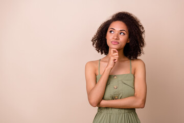 Photo of clever dreamy lady arm touch face has question doubt idea unsure look empty space isolated...