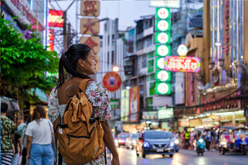 China town Bangkok Thailand, colorful streets of China Town Bangkok.Asian woman with bag, tourist visiting Chinatown