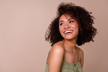 Close up photo of pretty young woman curly hair healthy skin salon treatment wear trendy khaki...