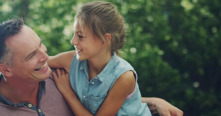 Happy father and daughter hugging while bonding outdoors together. Smiling little girl embracing her father, looking carefree, relaxed and enjoying free time together at a park on the weekend - Powered by Adobe