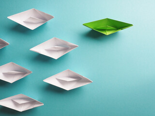 New ideas, creativity and various innovative solutions or leadership, ecology concept with paper boats