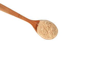 Maca Powder in wooden spoon on white background, close-up. Maca gelatinized flour. Peruvian superfood, natural organic supplement. Healthy eating