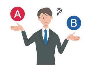 AとBを比較して悩むビジネスマン