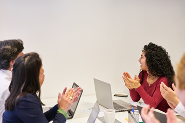 Business people applaud after online presentation