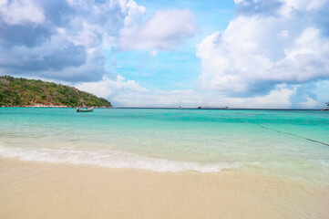 Vacation in paradise. Travel by Thailand. Beautiful landscape with white sand tropical beach and turquoise water.