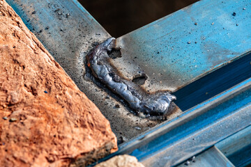 steel Construction Worker Welding Steel On Construction Site