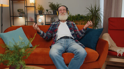Keep calm down, relax, inner balance. Senior old grandfather man breathes deeply with mudra gesture...