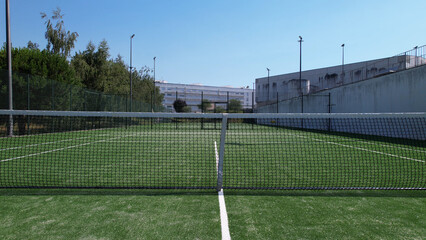 View of multi-functional sports area with tennis courts in Santo Tirso, Portugal.