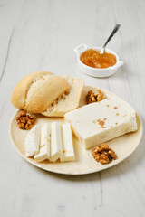 Homemade curd cheese with raisin and walnut