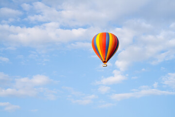 Colorful hot air balloon in flight 