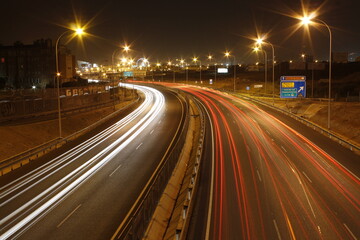 Naklejka na ściany i meble traffic on highway at night
