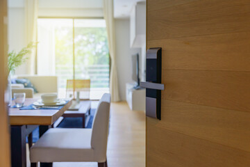  Hotel room , Condominium or apartment doorway with open door in front of blur bedroom background