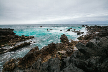 Fototapeta na wymiar beautiful and fabulous volcanic rock formations because of sea in tenerife spain