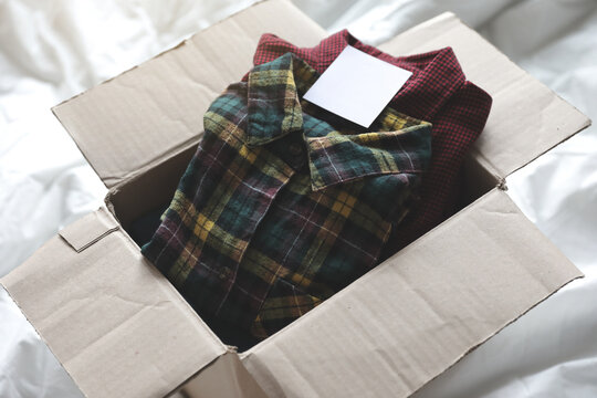 used clothes in a box. sustainalbe fashion