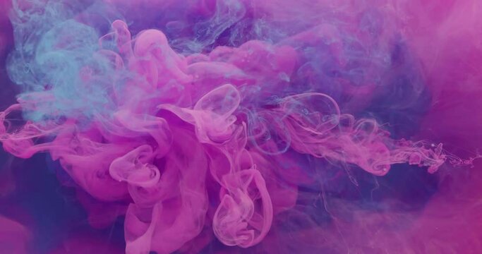 Paint mix in water. Color smoke blend. Logo reveal effect. Neon pink blue fluid underwater explosion on bright steam cloud abstract art background shot on RED Cinema camera.