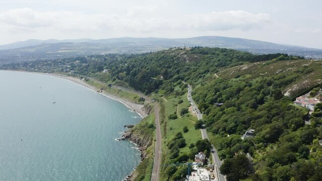 Moving towards The Obelisk located in Killiney Hill with the view of The Pyramid of Dublin on a sunny day, Ireland