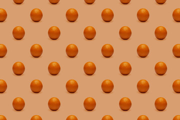 Fruit seamless pattern of fresh oranges on orange background. Pop art design, creative summer concept.