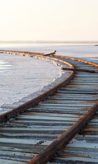 railroad on the shore of the salt lake