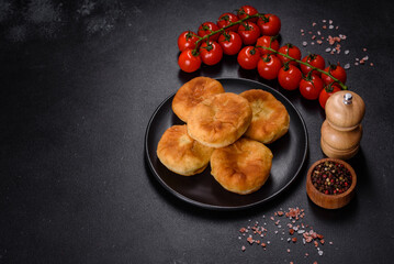 Traditional homemade pies with cabbage and sauerkraut on the plate