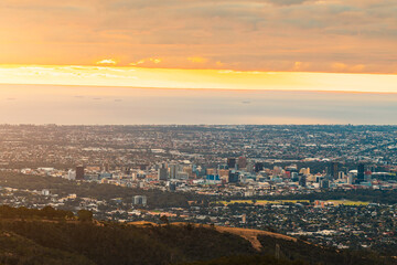 Fototapeta na wymiar Adelaide city skyline at sunset viewed from the hills, South Australia
