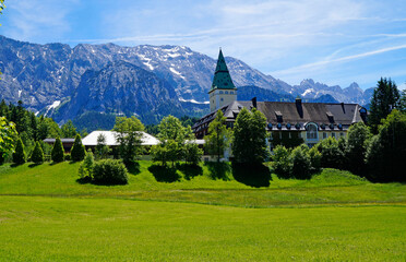 a scenic view of the Elmau Schloss Hotel in the german Alps where G 7 summits take place (Germany)	