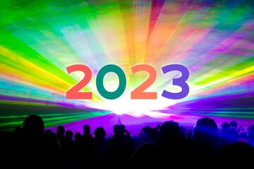 Happy new year 2023 colorful laser show party people crowd. Luxury entertainment with audience...