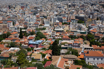 Fototapeta na wymiar General view of Athens. View of the city and its tile roofs on a sunny day. Greece, July 2022.