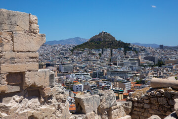 General view of Athens. View of the city and Mount Lycabette on a sunny day from the Acropolis. Greece, July 2022.