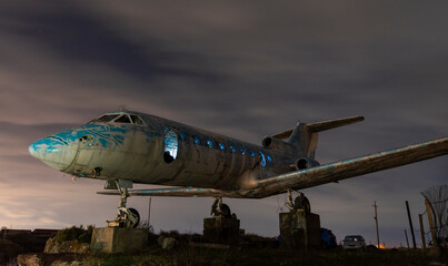 Old plane on the hill.Long exposure night shot