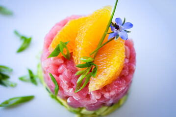 delicious tuna tartar with fresh avocado and orange