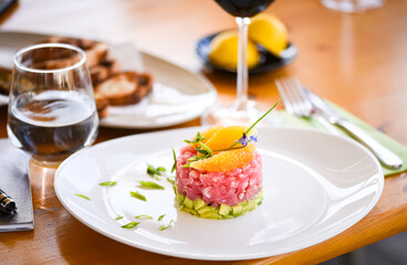 delicious tuna tartar with fresh avocado and orange
