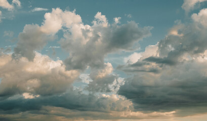 Naklejka na ściany i meble Clouds at sunset, summer sky background, evening cloudscape